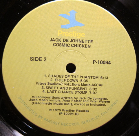 Jack DeJohnette's Directions - Cosmic Chicken LP NM or M- VG+ 1975 Prestige Jazz Fusion Vinyl: NM/M Cover: VG+ = Ultrasonic Cleaned on Kirmuss machine for superior audio and sonics! !!! This listing uses a stock photo. You will receive the exact pressing that the stock photo shows. We grade conservatively, and have been selling records/cd’s for over 25 years. Please inquire if you would like to see pictures of the actual item or have any questions. !!! - Image 4
